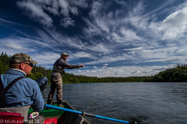 A fly angler casts for rainbow trout on Alaska's Legendary Wood River