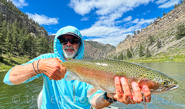 Fly Fishing Missouri River Land of the Giants Michael Carl photographed with wild rainbow trout