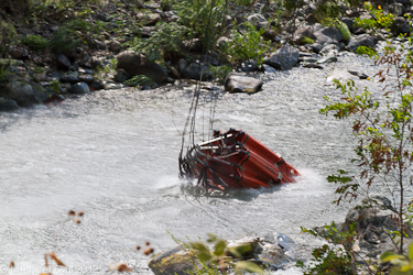 A bambi bucket about to draw water out of the Upper Sacramento River
